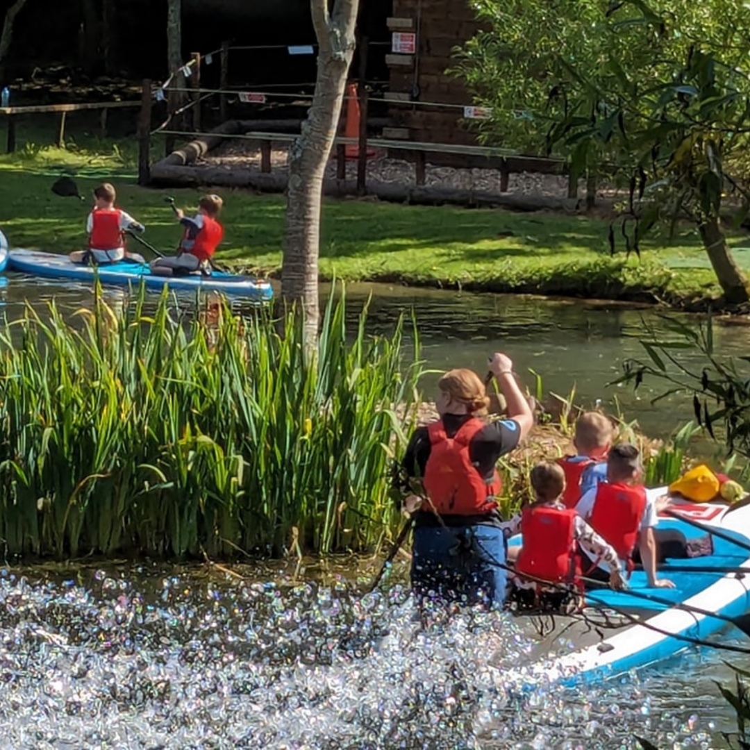 pupils learning to kayak